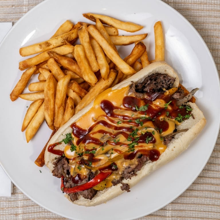 Indulge in Our Cheesesteak